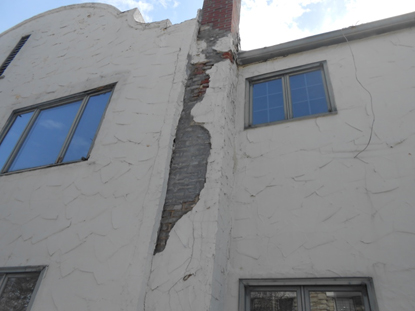 Signs of long-term condensation on building exterior- Humidity Control Services Kansas City MO